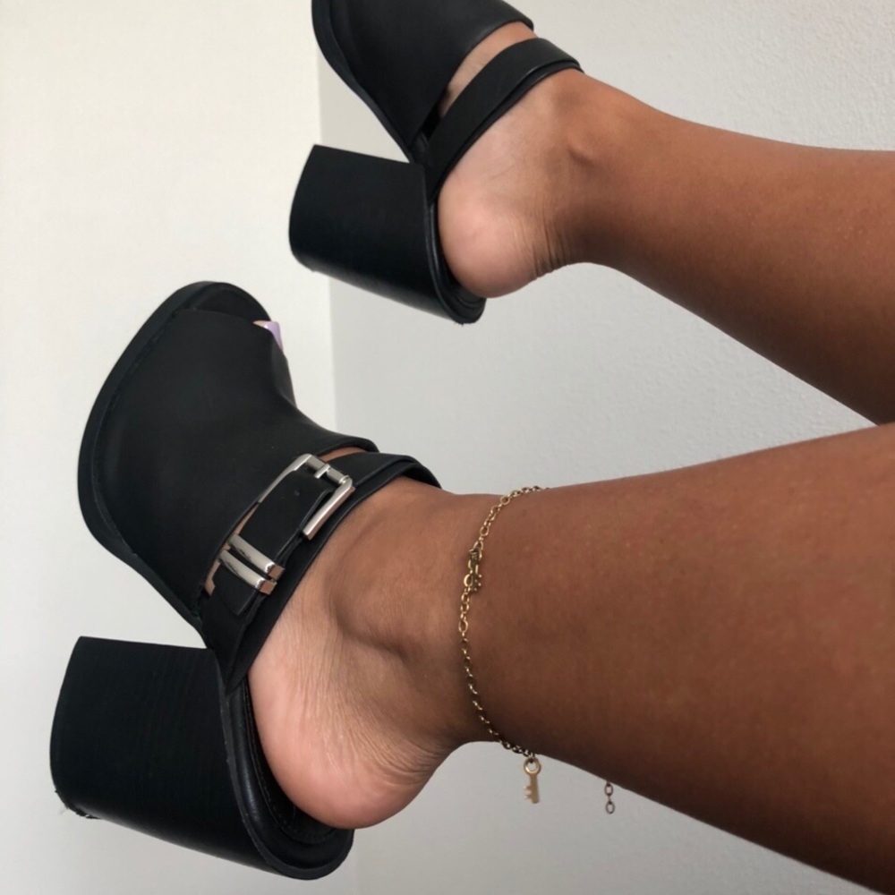 Black block heels with silver buckle